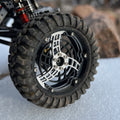 Earlier version pictured, preorders are for a version with stainless steel and brass wheel faces. 